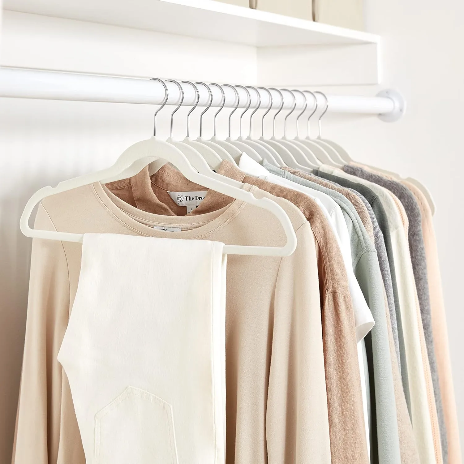 Amazon Basics Slim, Velvet, Non-Slip Suit Clothes Hangers, Ivory/Silver - Pack of 50 [IMPORTED]