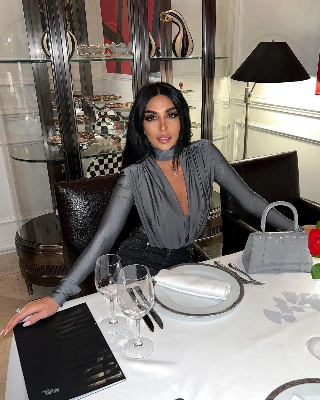 Elegant Draped V-Neck Long Sleeve Bodysuit with High-Cut Silhouette