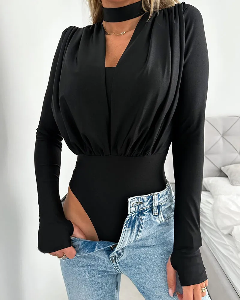 Elegant Draped V-Neck Long Sleeve Bodysuit with High-Cut Silhouette