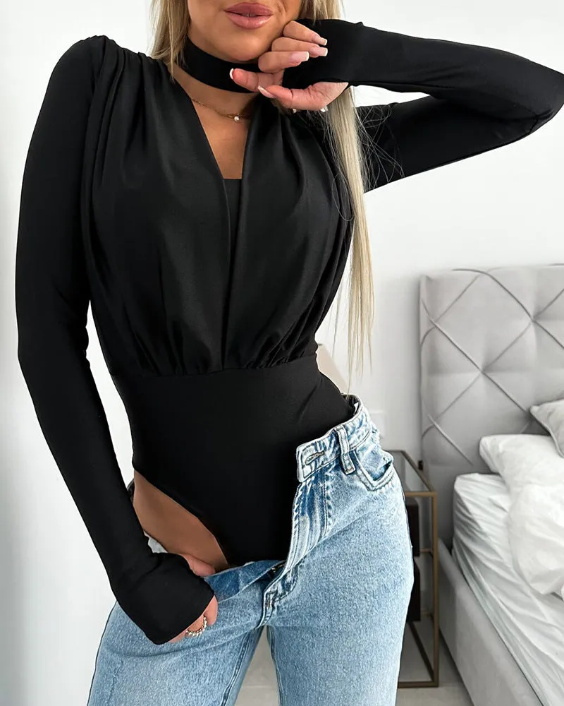 Elegant Draped V-Neck Long Sleeve Bodysuit with High-Cut Silhouette